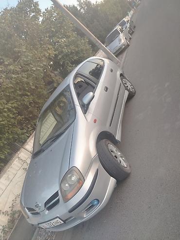 lancer evolution: Nissan Almera Tino: 2000 г., 1.8 л, Механика, Бензин, Минивэн — 7