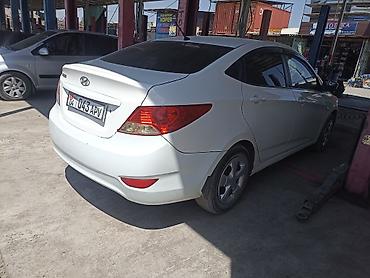 rota grid: Hyundai Accent: 2012 г., Механика, Седан — 3