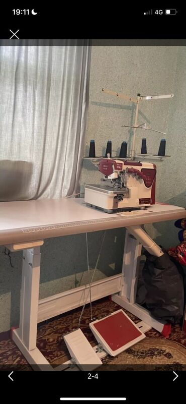 ручной швейный машинка: Тигүүчү машина Оверлок