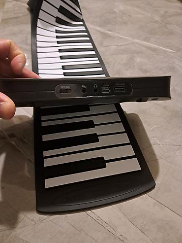 Musiqi alətləri: Daşınan qatlanan rəqəmsal piano (roll-up keyboard) Maya deyerine — 4