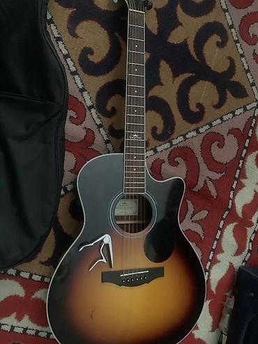 пини: Электроакустическая гитара с вырезом (cutaway), окраска sunburst — 4