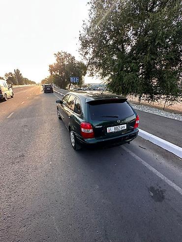 daf 95 480: Mazda 323: 2000 г., 1.6 л, Механика — 5