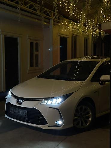 электра машына: Toyota Corolla: 2019 г., 1.8 л, Гибрид, Седан — 2