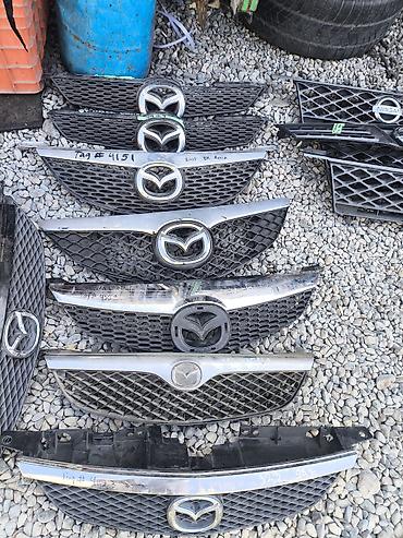 Решетка радиатора Mazda 2001 г., Б/у, Оригинал at lalafo.kg Решетка радиатора Mazda 2001 г., Б/у, Оригинал