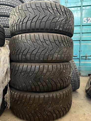 зимние: Шины 285 / 60 / R 18, Зимняя шипованная, Б/у, Комплект, Внедорожные (АТ/МТ), Корея, Kumho — 1