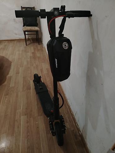 9: Elektrikli skuter – oturacaqlı, gücləndirilmiş asqılı model — 4