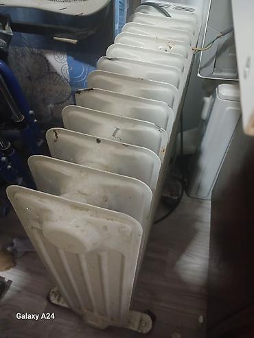 yag peci satilir: Yağ radiatoru satılır.dəmmir döküm Ağ rəngli, çox bölməli elektrik — 2