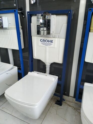 unitax: Grohe firmasının divara quraşdırılan unitazı. Ağ rəngdədir və müasir