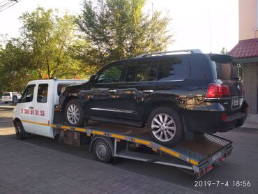 Услуги эвакуатора: С прямой платформой, С ломаной платформой, С частичной погрузкой — 7