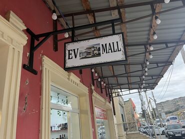 əcəmidə 2 otaqlı kirayə evlər: EV MALL – ev üçün mağaza - Mağaza fasadlı və nəzərə çarpan asma lövhə