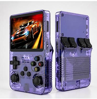 Другие игры и приставки: Retro daşınan oyun konsolu – şəffaf bənövşəyi korpus - 3.5" rəngli — 2