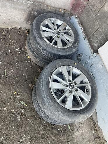 Колеса в сборе: 4 колёса комплект Kia: литые диски с шинами.г - Оригинальные — 1