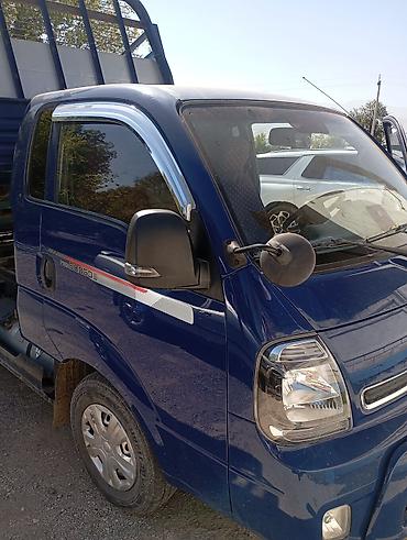crv 2: Грузовик Kia Bongo III, синий, бортовой самосвал. Основные — 1