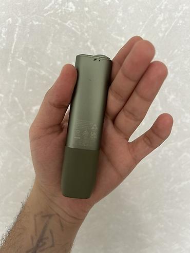 iqos stick: Məhsul: IQOS Iluma One (yaşıl rəng) Xüsusiyyətlər: - Tütün çubuqları — 7