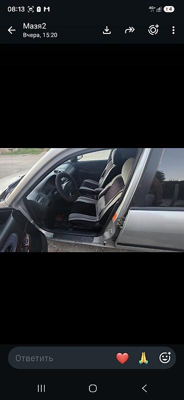 наклейка авто: Mazda Familia: 1998 г., 2 л, Автомат, Бензин, Седан — 1