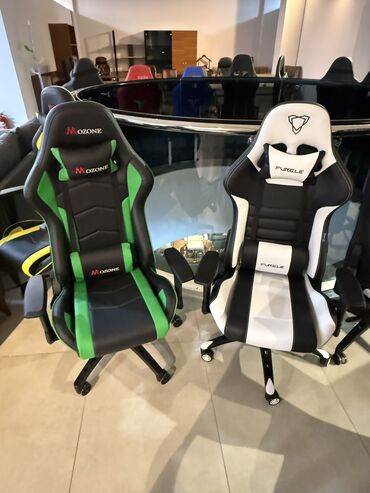 Ofis və oyun kresloları: Təkərli, Qolları tənzimlənir, Süni dəri — 23