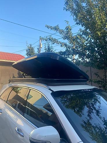 baqaj dam: Avtomobil üçün dam üstü baqaj qutusu (roof box). Aerodinamik formalı — 5