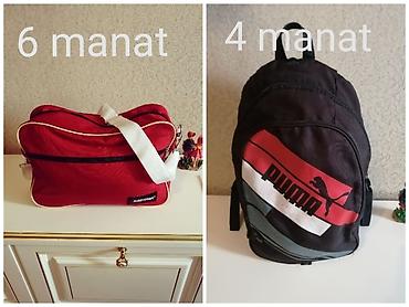 Çantalar: Satılır: 2 ədəd çanta 1) Eastpak çiyin çantası – 6 manat - Rəng — 1
