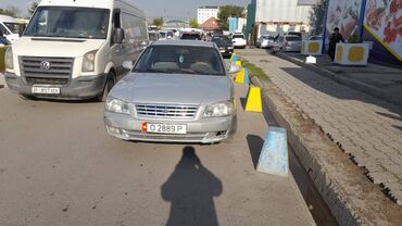 самурай ош: Kia Magentis: 2001 г., 2 л, Механика, Газ, Седан