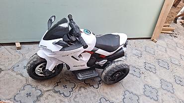 Uşaq üçün elektrik maşınları: Uşaq üçün elektrikli üçtəkərli motosiklet - Model: Motion (üzərində — 2