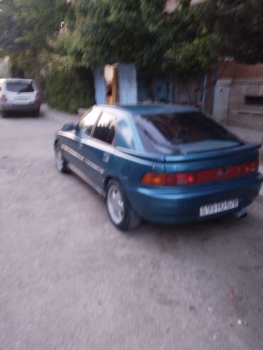 maşın 09: Mazda 323: 1.6 l | 1992 il Hetçbek
