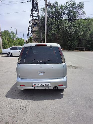 range over: Nissan Cube: 1999 г., 1.3 л, Автомат, Бензин, Минивэн — 4