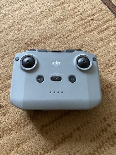 гироскопический пульт ду: Пульт дистанционного управления DJI в сером цвете, предназначенный для