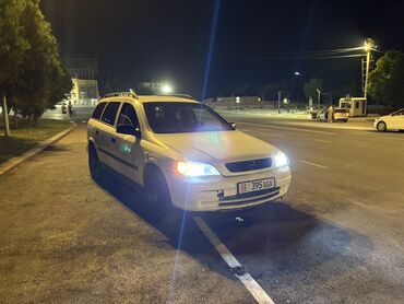 продам документы на авто с железом: Универсал Opel Astra белого цвета. Этот автомобиль – практичное и