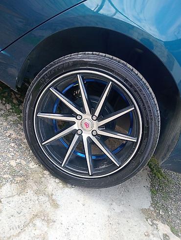 disk teker 4 bolt: Avtomobil üçün 4 ədəd yüngül lehimli disk və şin komplekti. vossen — 1
