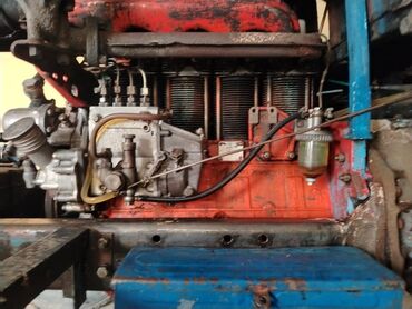 Traktorlar: Mavi rəngli kabinalı təkərli traktor - Güclü dizel mühərrik (şəkildə — 4