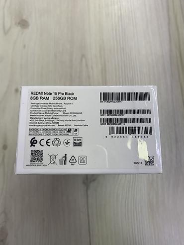 poco s40: Смартфон Xiaomi Redmi Note 15 Pro в чёрном цвете. На коробке указана — 2