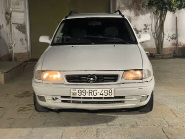 запчасти авто опель омега: Opel Astra F Caravan (ağ rəng, universal kuzov) 1.7sade dizel