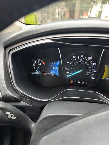 disk maşın: Ford Fusion sedan – qara rəng, modern və aerodinamik dizayn. 2017 — 6