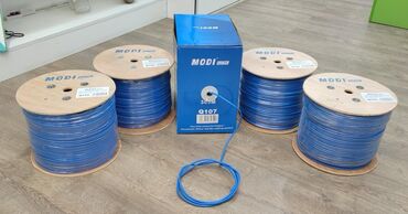 internet kabel: MODI brendinin göy rəngdə, 4 ədəd taxta çarx üzərində olan kabeli