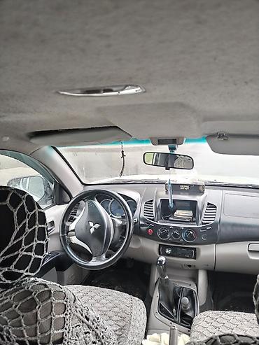 235 55 18: Mitsubishi L200: 2.4 l | 2008 il 302118 km Pikap — 7
