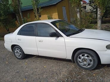 мини автомойка: Daewoo Nubira: 1997 г., 1.6 л, Механика, Бензин, Седан