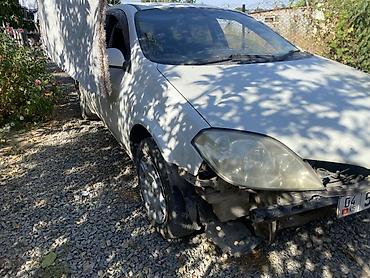 крыло на камаз: Nissan Primera: 2003 г., 2 л, Вариатор, Бензин, Универсал — 1