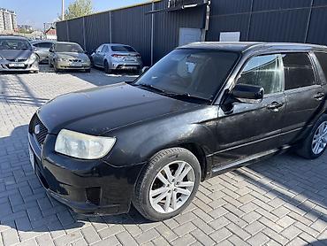 значок bmw: Subaru Forester: 2006 г., 2 л, Автомат, Бензин, Кроссовер — 3