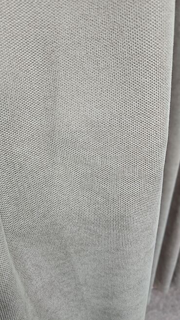 Parçalar: Ağ rəngli, nazik, şəffaf parçadır. Üzərində həndəsi naxışlar var — 6