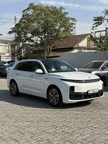 bme e39: Lixiang L7: 2024 г., 1.5 л, Гибрид, Кроссовер — 1