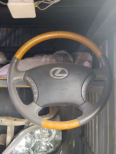 Руль Lexus с деревянными вставками и кожаной отделкой at lalafo.kg Руль Lexus с деревянными вставками и кожаной отделкой