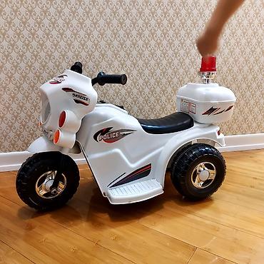 Uşaq dünyası: Uşaq üçün elektrikli polis motosikleti (3 təkərli) - Rəng: ağ — 1