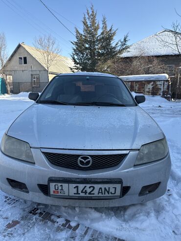 Mazda: Mazda 323: 2002 г., 1.3 л, Механика, Бензин, Седан