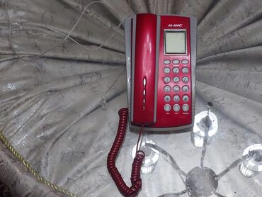 islenmis telefon satisi: Stasionar telefon Simli, İşlənmiş, Ünvandan götürmə