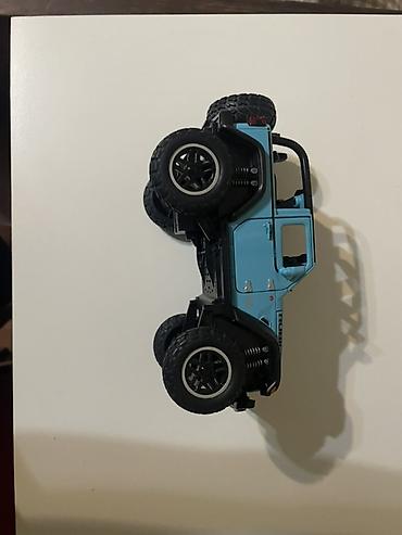 Jeep: Модель внедорожника Jeep Wrangler Rubicon 1:32 (прибл.) в голубом — 2