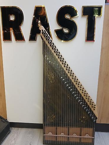 Musiqi alətləri: Kanon musiqi aləti Kanon, Qanun Kanon musiqi aləti Üzerinde — 10