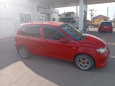 e34 4 4: Mazda Demio: 2003 г., Бензин, Хэтчбэк — 4