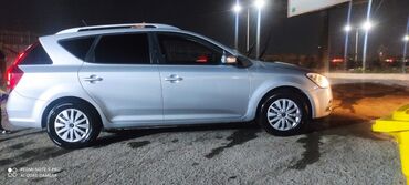 Kia: Kia Cee’d SW (universal) – gümüşü rəng Dövlət nömrə nişanı: 77-SK-794 — 6