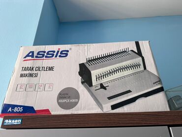 Qovluqlar və fayllar: 130 azn. Assis tərəfindən istehsal edilmiş tarak ciltləmə makinası