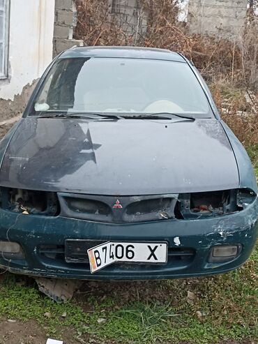 спортивный газон: Автомобиль Mitsubishi Lancer в кузове универсал. Цвет кузова -